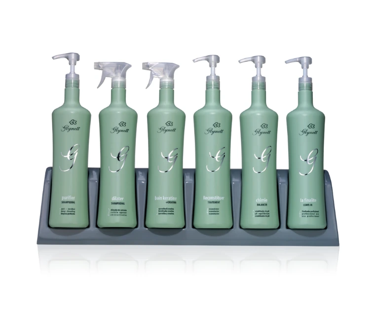 Seis produtos Glynett: Purifier, Dilater, Bain Keratine, Reconstituer, Chimie e La Finalite, nessa ordem da esquerda para a direita